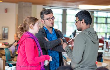 Students and staff talking